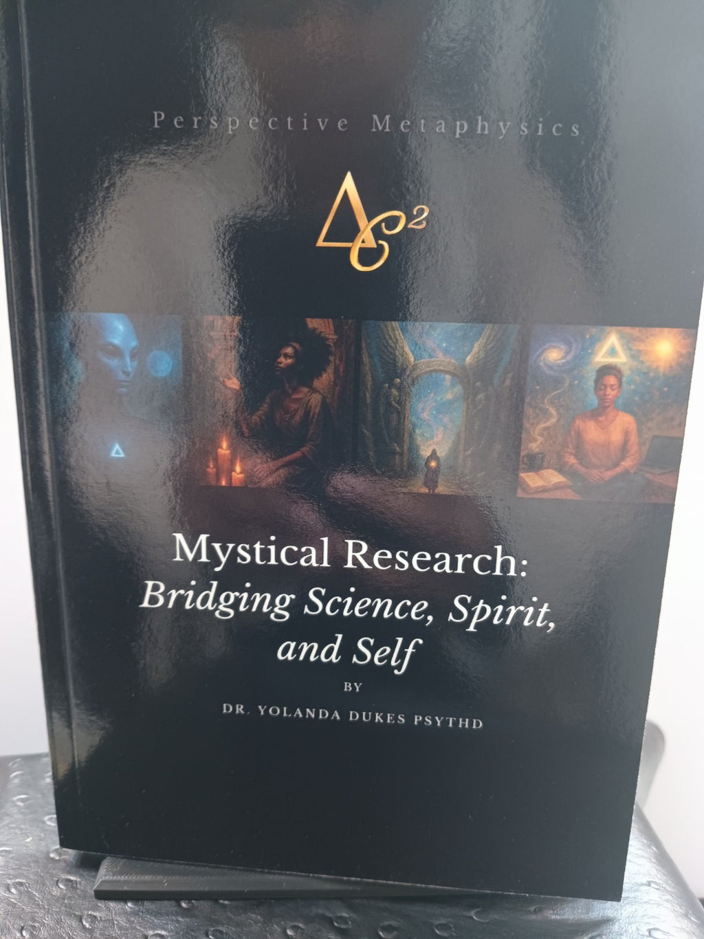 Physical copy of Mystical Research: Bridging Science, Spirit, and Self by Dr. Yolanda Dukes