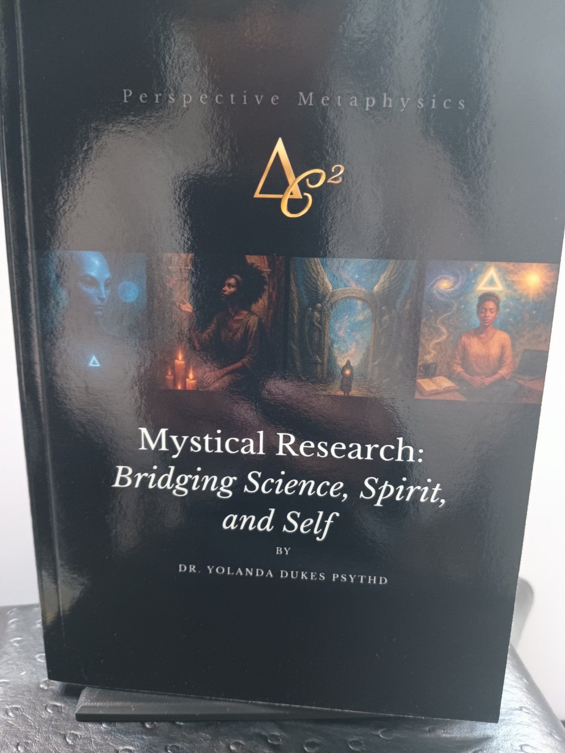 Physical copy of Mystical Research: Bridging Science, Spirit, and Self by Dr. Yolanda Dukes