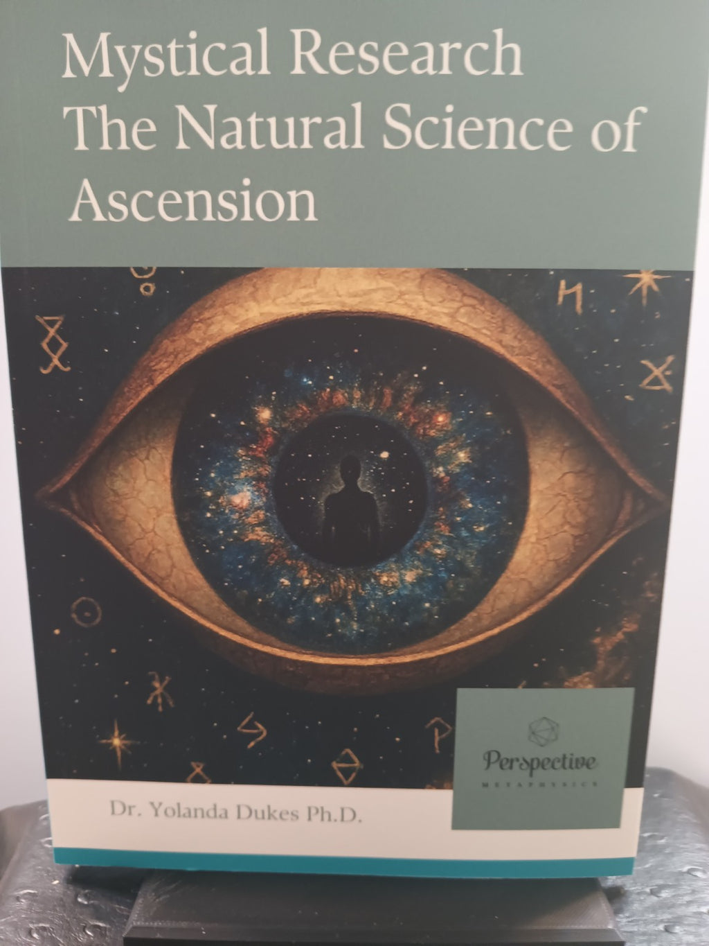 Physical copy of Mystical Research: The Natural Science of Ascension by Dr. Yolanda Dukes